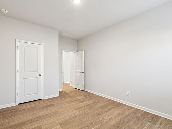 Secondary bedroom in the Johnson floorplan at a Meritage Homes community in Garner, NC.