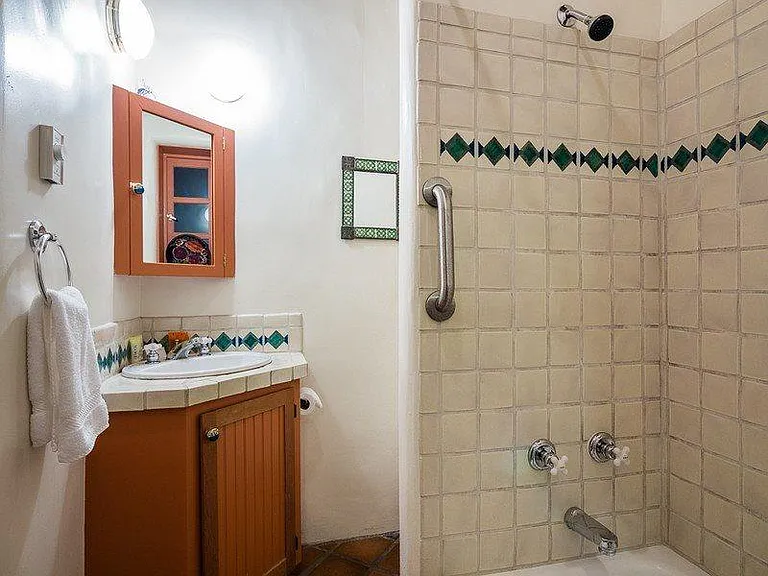 Bath with full tub & shower.