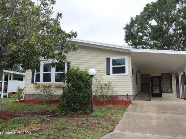 714 Hyacinth Cir, Barefoot Bay, FL 32976