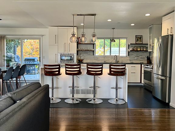 Large open concept living, dining kitchen with tons of natural light.