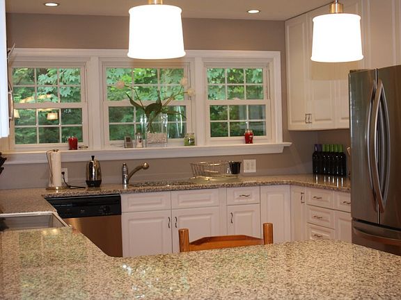 Granite Countertops, Stainless Steel Appliances, Recessed Lighting.