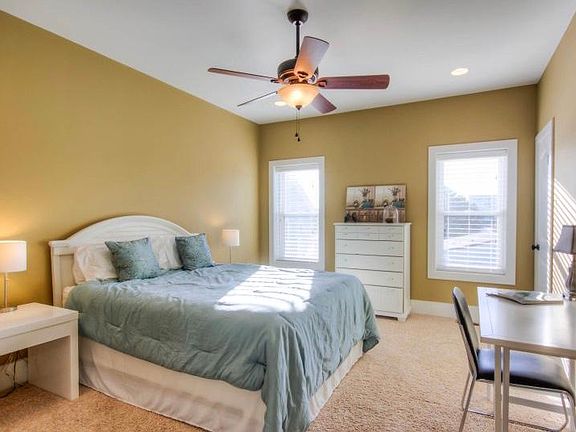 Master bedroom with attached closet and Andy master bathroom. Also a desk area to get work done.