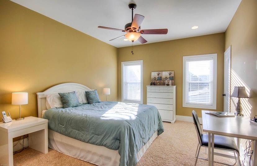 Master bedroom with attached closet and Andy master bathroom. Also a desk area to get work done.
