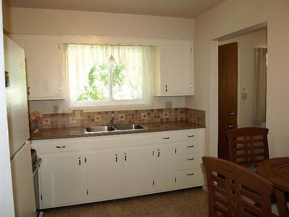 Kitchen Features New Paint, New Countertops w/Backsplash, Refrigerator!
