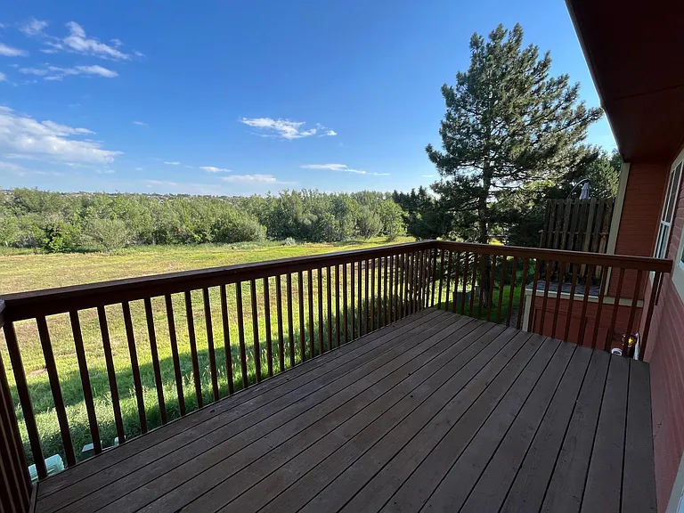 Large deck with plenty of room for a BBQ and table