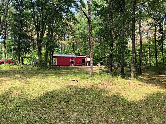 Comfortable camphouse and shaded grounds perfect for picnicking, gatherings, horse shoes and telling tall tales