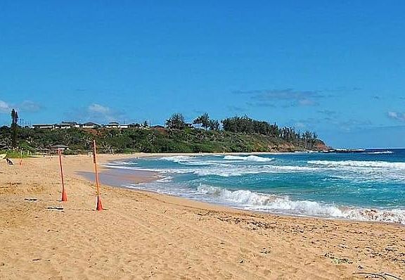 Surf at Kealia Beach a few minutes away