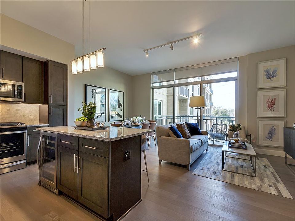 Open kitchen with island with wine cooler