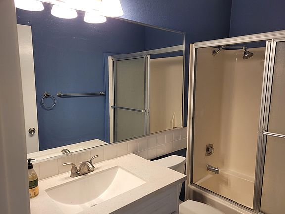 Renter's bathroom includes a shower and tub. Vanity and fixtures were recently upgraded.