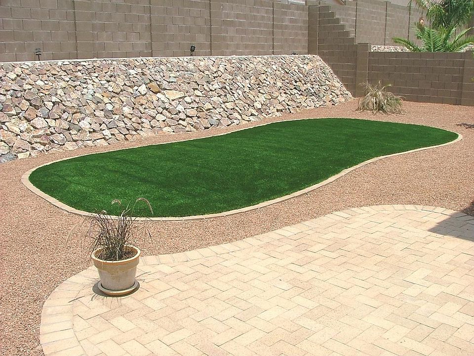 Backyard- Grass thats always green. NO WATER REQUIRED! Dead Palm Tree replaced