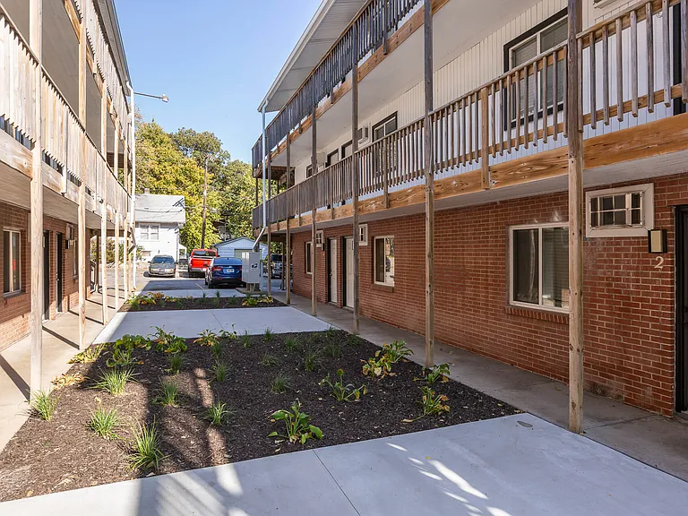 Landscaping between the two buildings at Cuming St. Apartments.