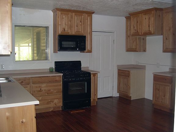 Large Kitchen with New Walnut Hardwoods