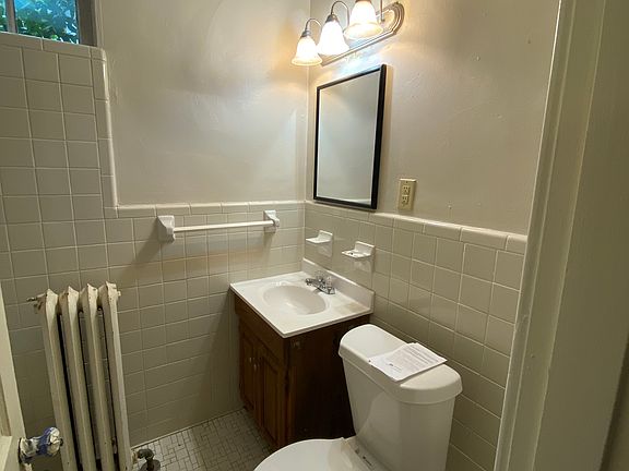 Full bathroom, including newly refinished tub, new paint and fixtures.