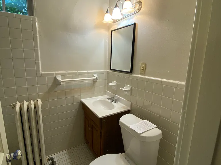 Full bathroom, including newly refinished tub, new paint and fixtures.