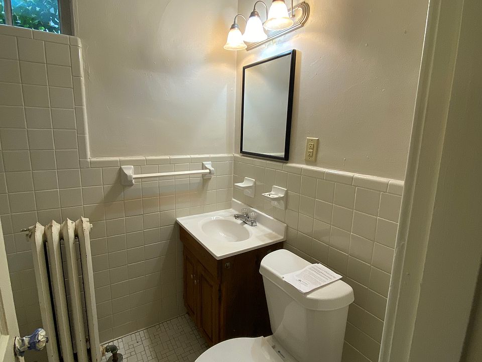 Full bathroom, including newly refinished tub, new paint and fixtures.
