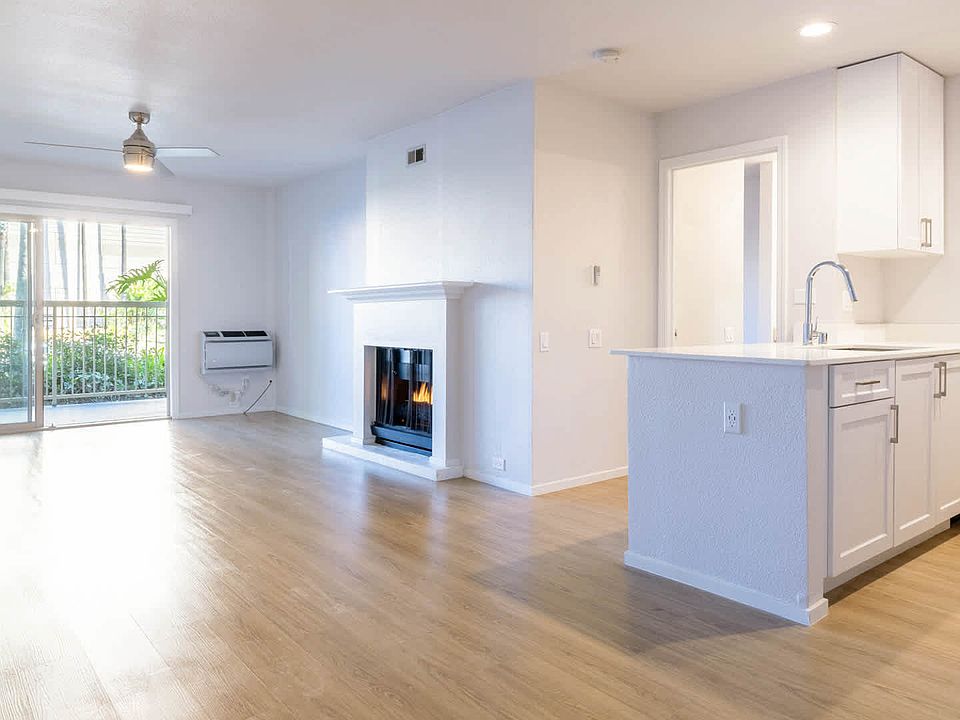 Living Room with Fireplace and Patio