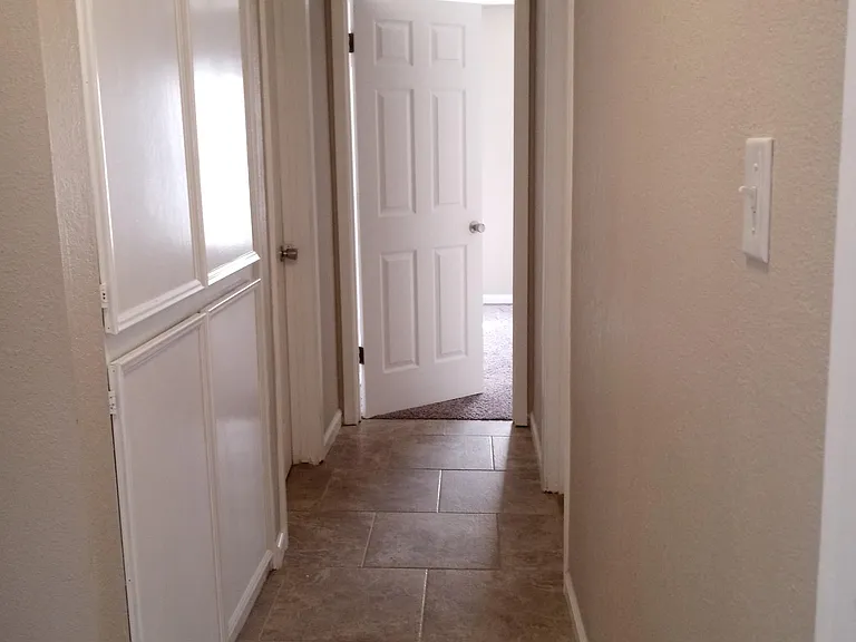 Hallway with plenty storage area