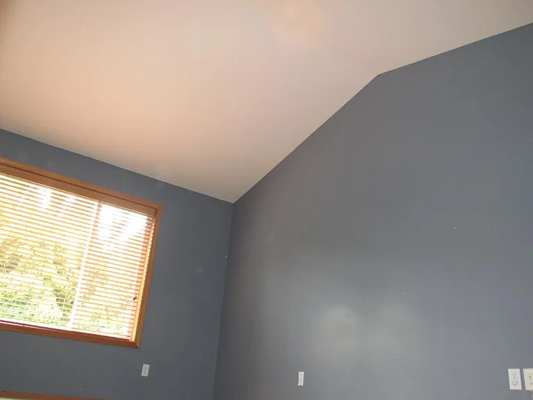Master bedroom with vaulted ceiling