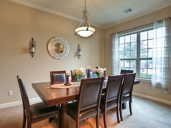 Neutral walls with limited wall decor is indicative of the newness of this home!
