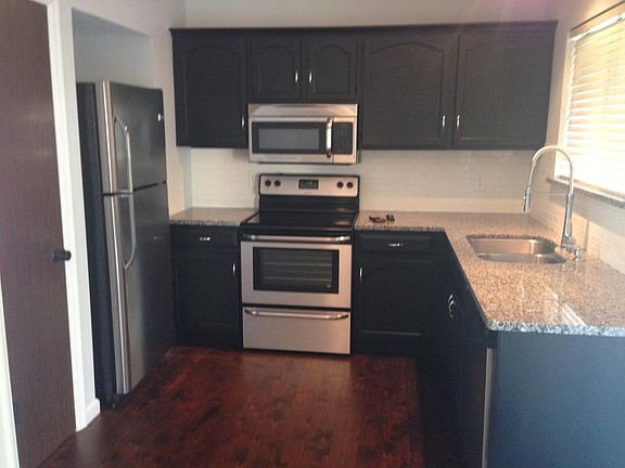 Updated kitchen with granite and stainless steel