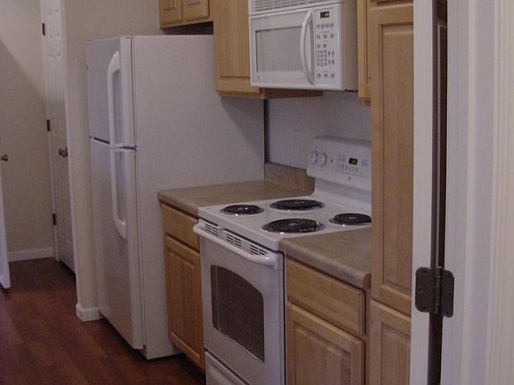 refrigerator with ice maker in freezer, 4 burner stove with