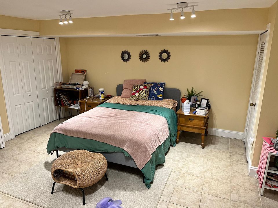 Large bedroom area with plenty of storage space
