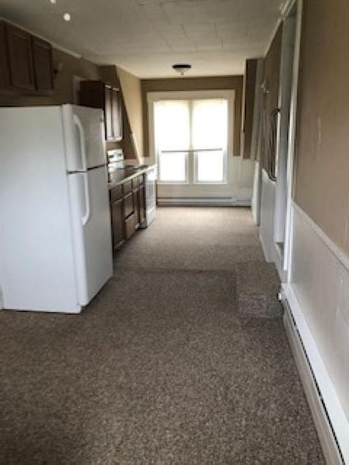 Kitchen with washer and dryer
