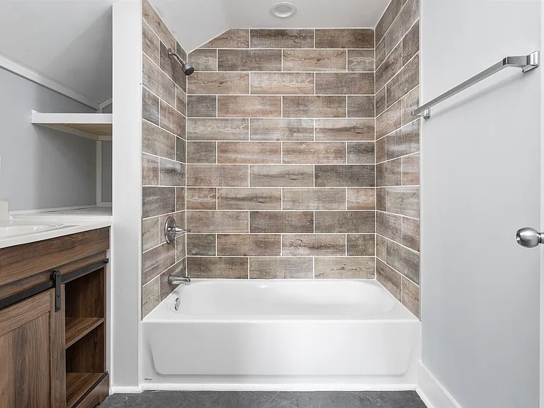 Main bathroom is downstairs next to laundry room off kitchen.
