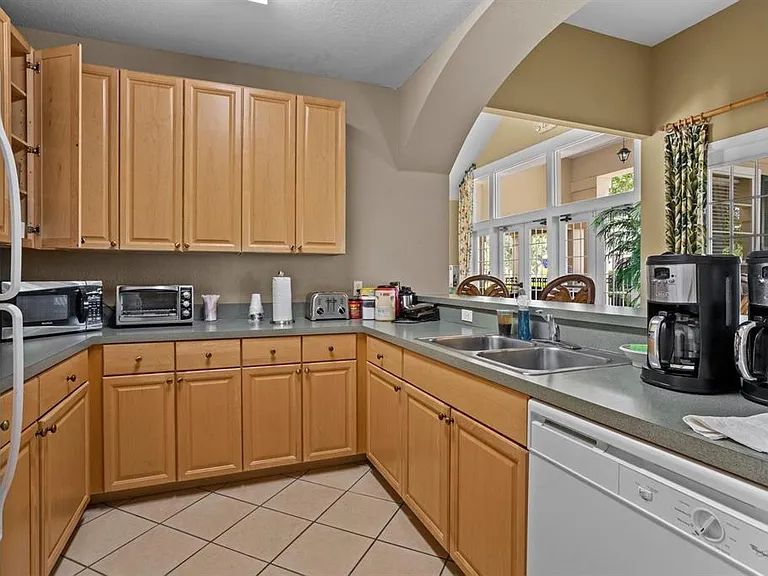 4013 Venetian Bay Dr #107 — Photo 32