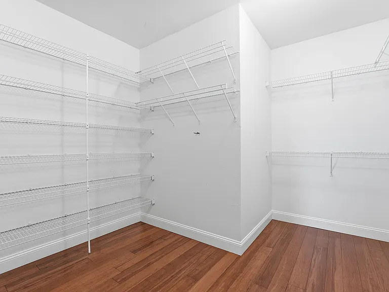 Walk-in closet off primary bedroom