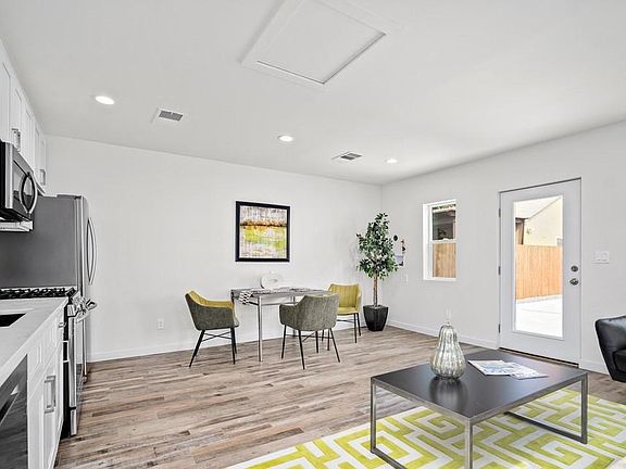 Features gas range, new stainless steel appliances, and a brand new washer and dryer