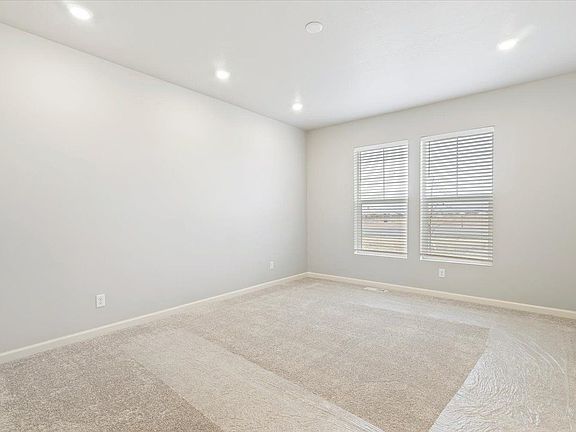 A view of the master bedroom and windows