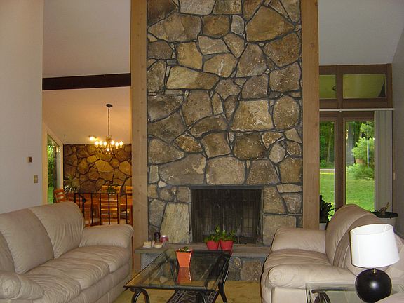 Living Room Fireplace and Dinning Room