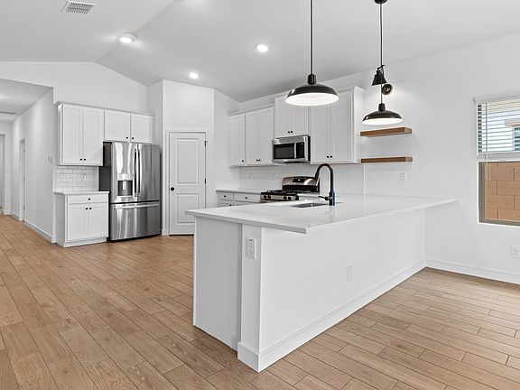 Kitchen with pendant lighting