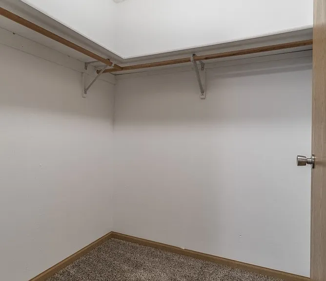 Large walk-in closets offer plenty of space to keep your wardrobe organized.