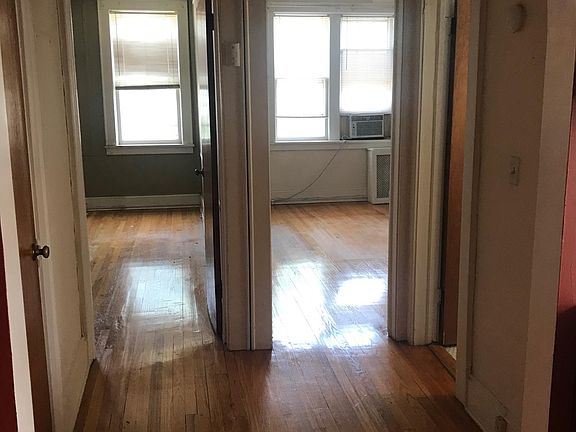 Entry way into 2 bedrooms and bathroom
