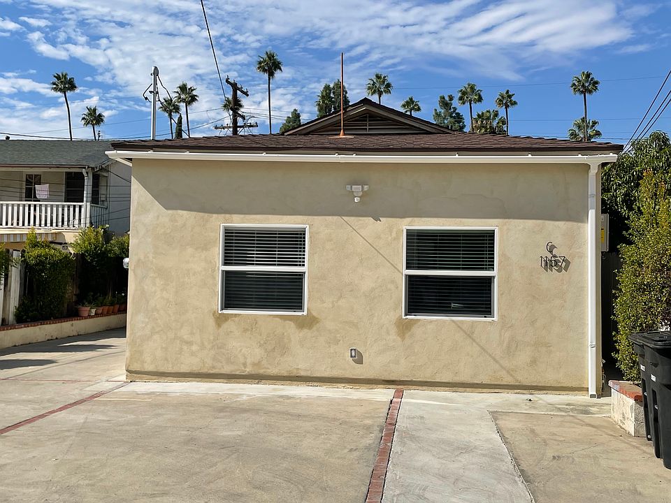 This unit shares one wall with a neighboring unit behind it.