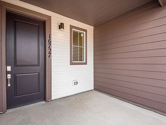 Detail of farmhouse style exterior and entry
