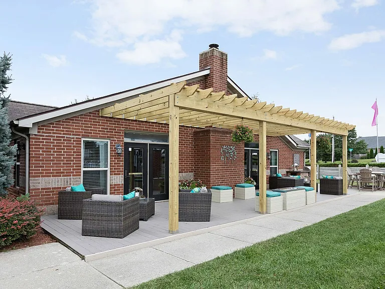Whether you're catching up with neighbors or soaking in some quiet time, the outdoor lounge is a favorite retreat.