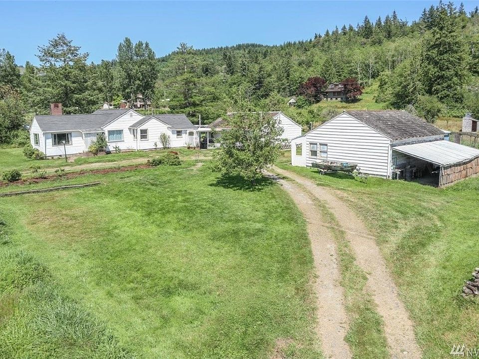 Main home to the left.  Property is two acres and two tax parcels.