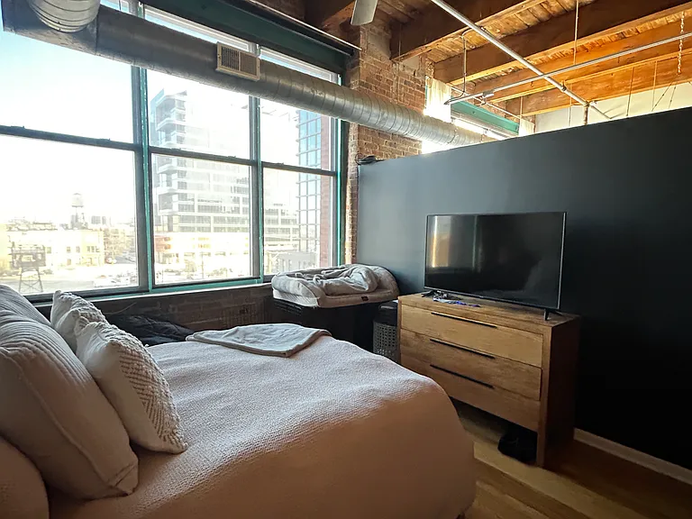 Another view of the primary bedroom