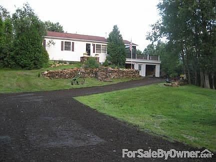 The house
						:
						from parking area