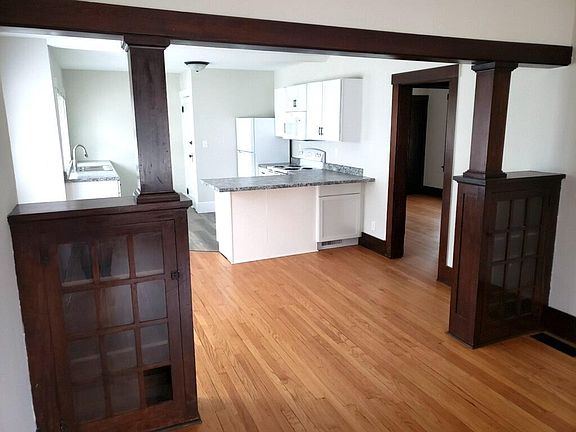 Hallway Leading to Upstairs Bedroom and Bathroom just off Kitchen / Dining Room