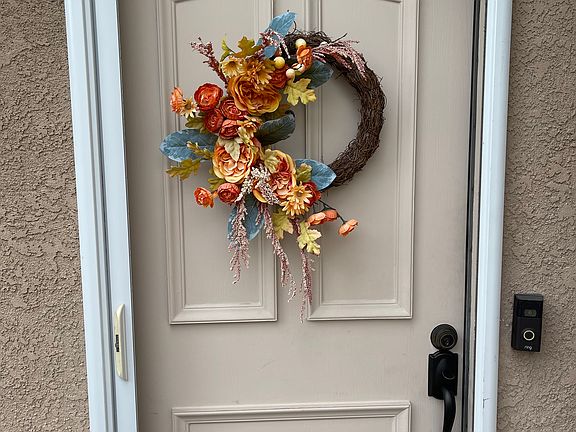 Front door with screen door and ring doorbell