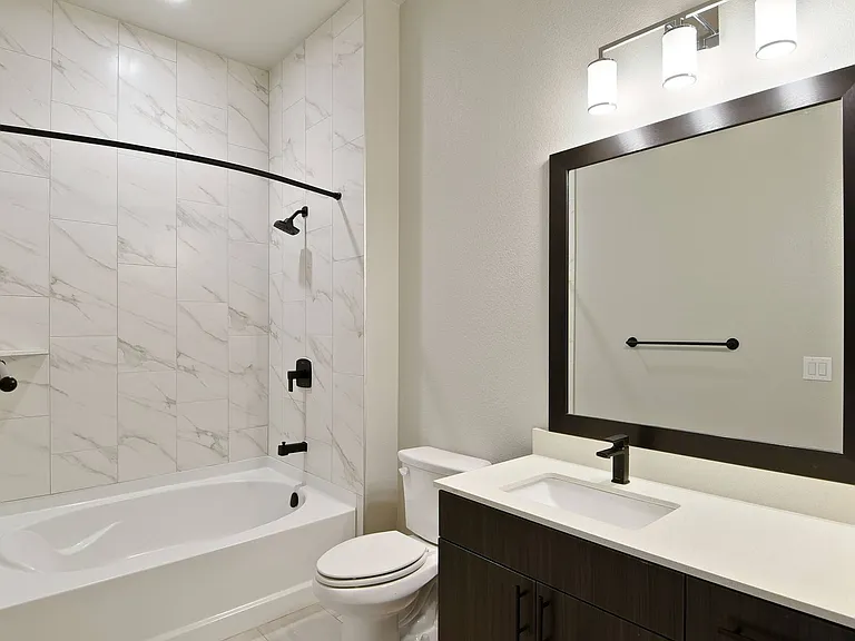 Step into a stylish bathroom that combines functionality with a spa-like feel.