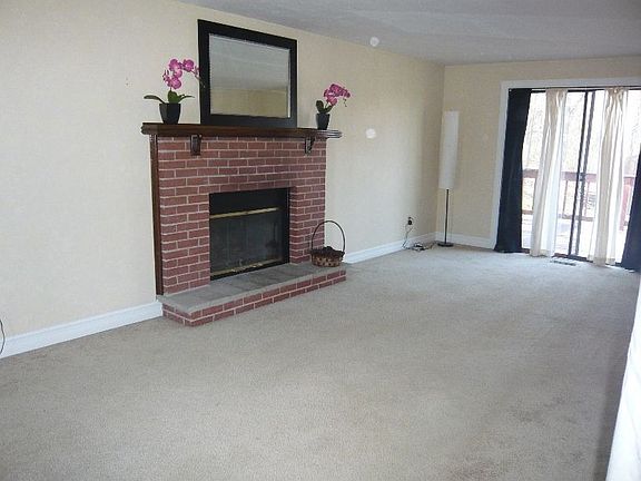 Family Room with Fireplace and Slider to Deck