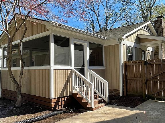 Screened in porch from back yard