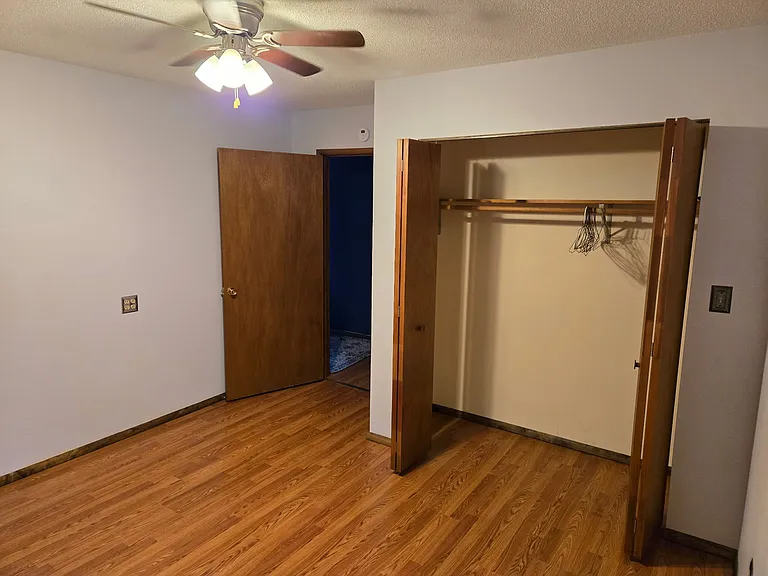 Bedroom 1 has ceiling fans and attached bathroom. (All three bedrooms are roughly the same size and have closets).