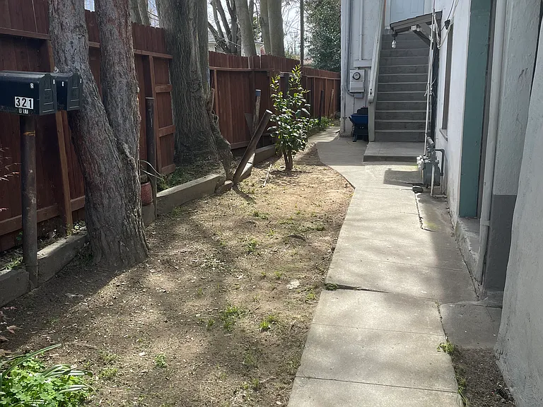 Side of duplex with private access and optional secondary entry to Unit #2