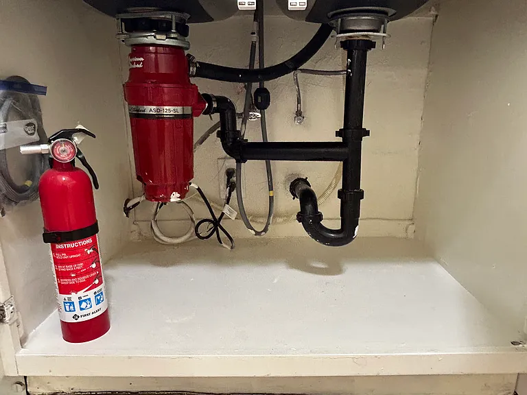 NEWER PLUMBING WITH SLIMLINE GARBAGE DISPOSAL